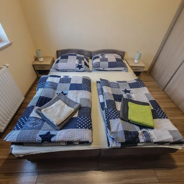 Sypialnia apartamentu w Ostródzie